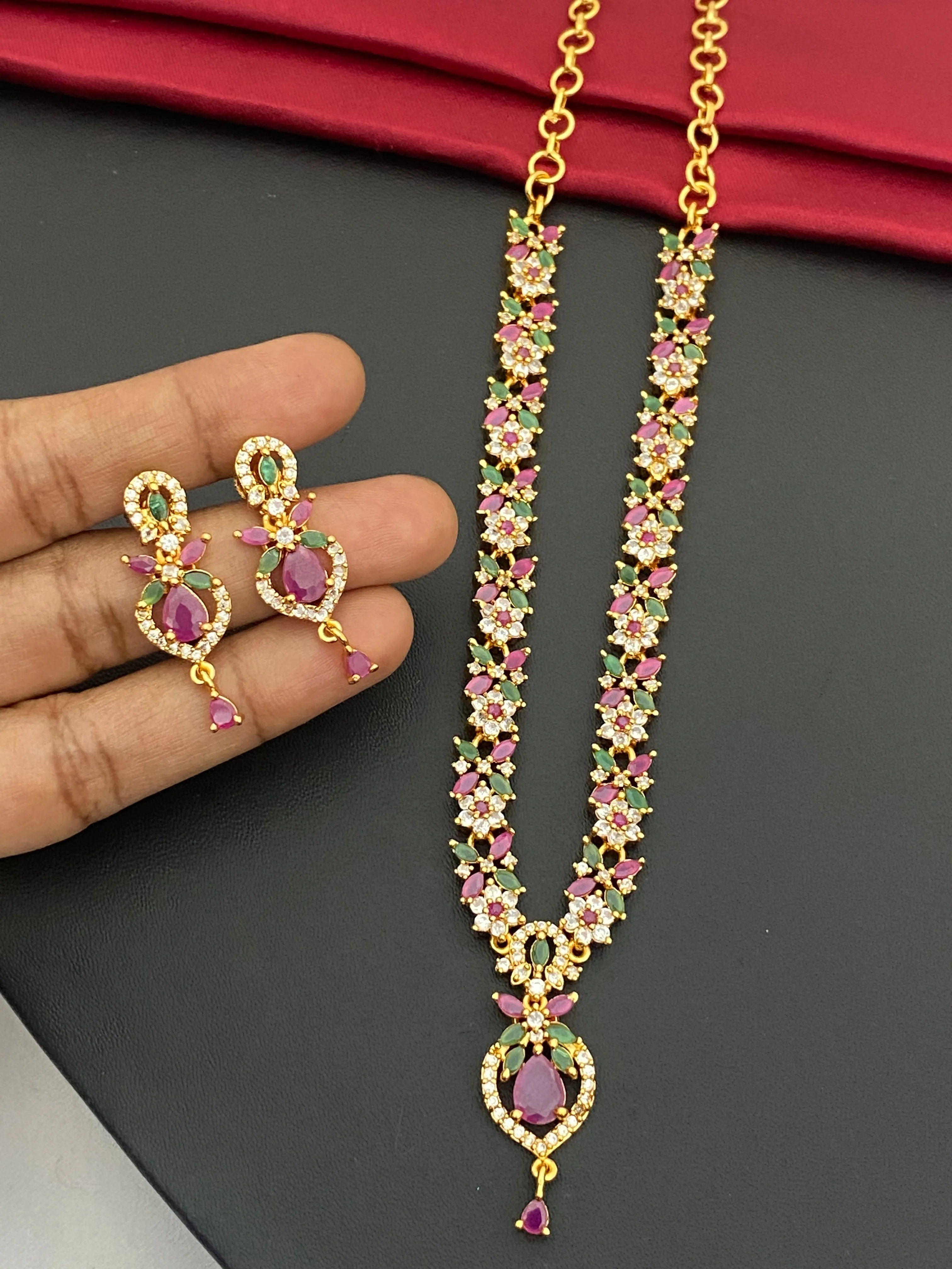 Pretty Gold Plated Multi Color Stoned With Floral Designer Necklace And Earrings
